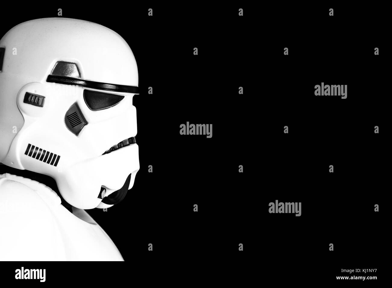 SELBY, UK - NOVEMBER 20, 2017.  The profile of a Stormtrooper from the Star Wars movies in profile and on a black background with copy space. Stock Photo