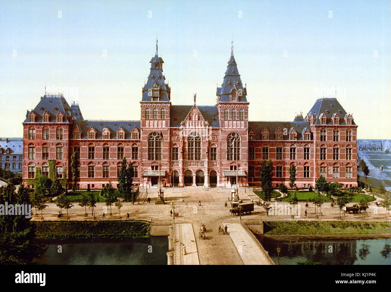 photomechanical print dated to 1900, depicting the Rijksmuseum, Amsterdam; Holland. The Rijksmuseum is a Dutch national museum dedicated to arts and history in Amsterdam. The museum is located at the Museum Square in Amsterdam. The Rijksmuseum was founded in The Hague in 1800 and moved to Amsterdam in 1808. The current main building was designed by Pierre Cuypers and first opened its doors in 1885. Stock Photo