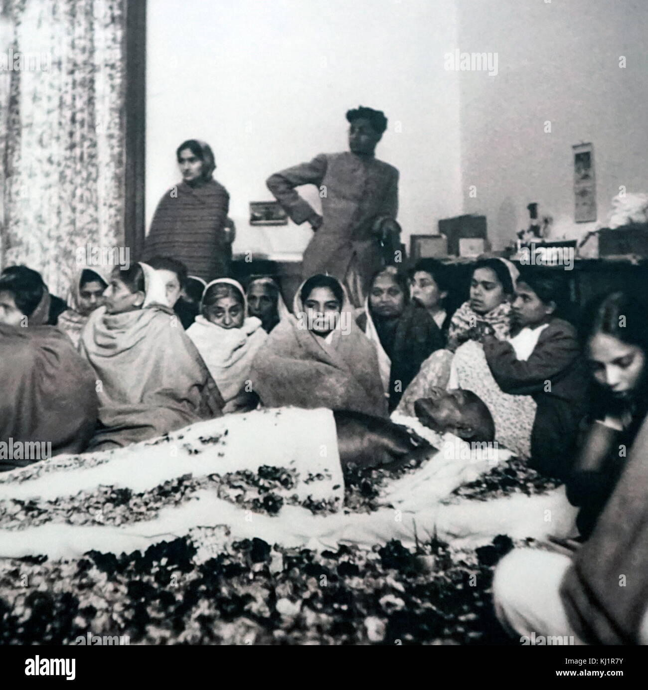 supporters surround the body of Gandhi before his cremation. Mohandas ...