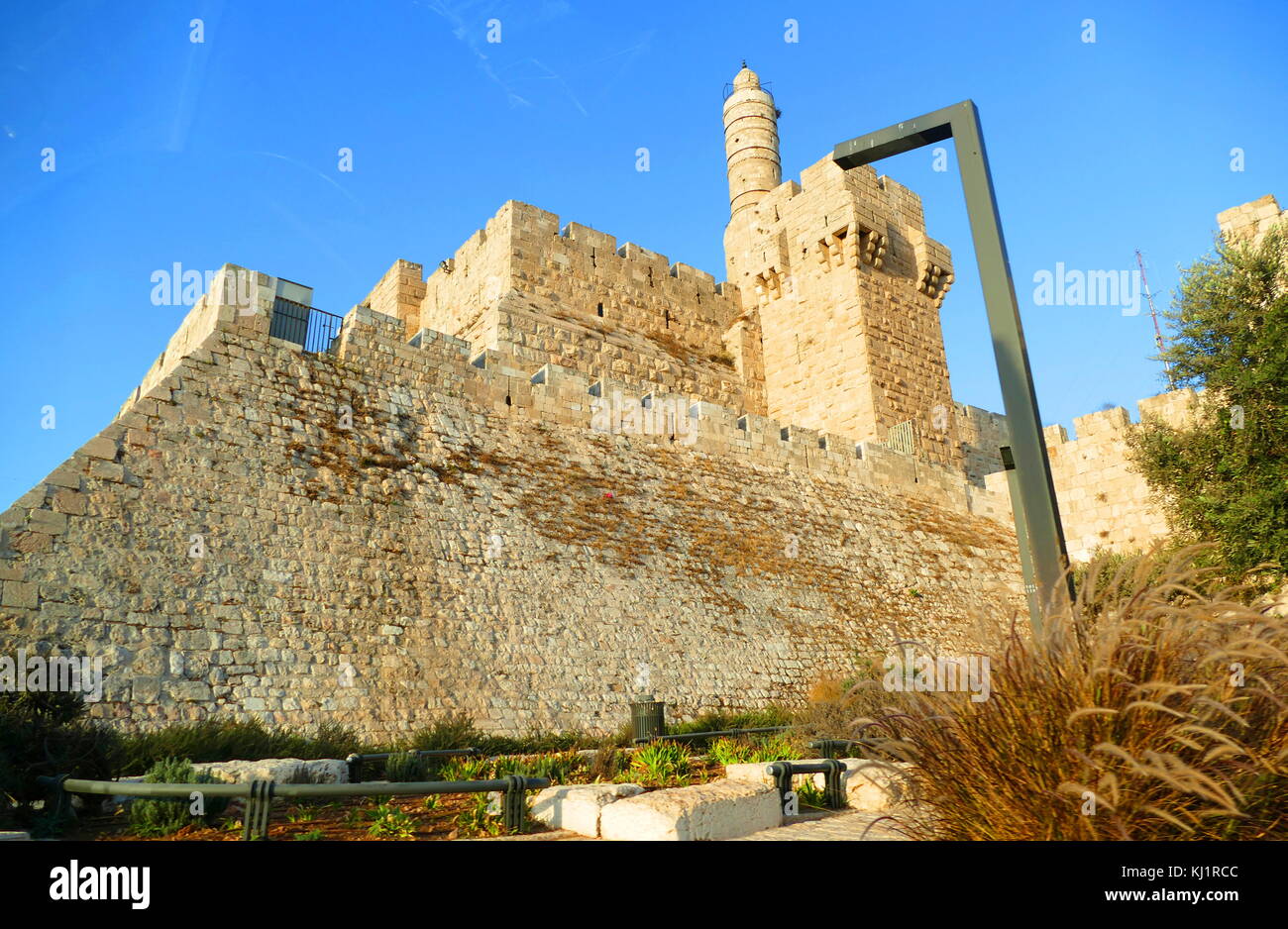 The Tower of David (Migdal David, Burj Daud), known as the Jerusalem Citadel, is an ancient citadel located near the Jaffa Gate entrance to western edge of the Old City of Jerusalem. The citadel that stands today dates to the Mamluk and Ottoman periods. It was built on the site of an earlier ancient fortification of the Hasmonean, Herodian-era, Byzantine and Early Muslim periods, after being destroyed repeatedly during the last decades of Crusader presence in the Holy Land by Ayyubid and Mamluk rulers. Stock Photo