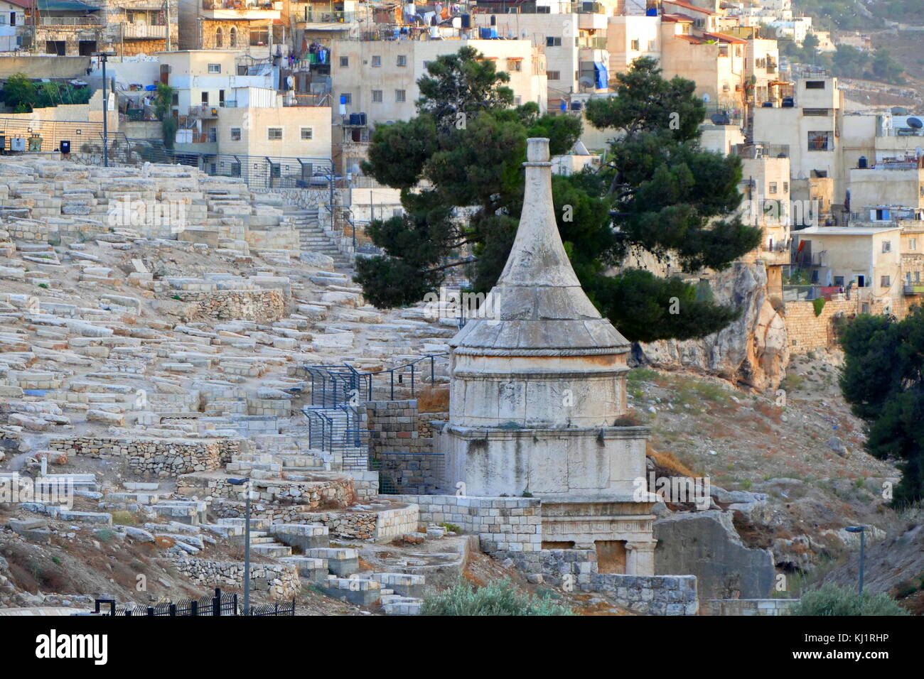 Tomb of Absalom, an ancient monumental rock-cut tomb in the Kidron Valley in Jerusalem. Although traditionally ascribed to Absalom, the rebellious son of King David of Israel (circa 1000 BCE), recent scholarship has attributed it to the 1st century CE. Stock Photo