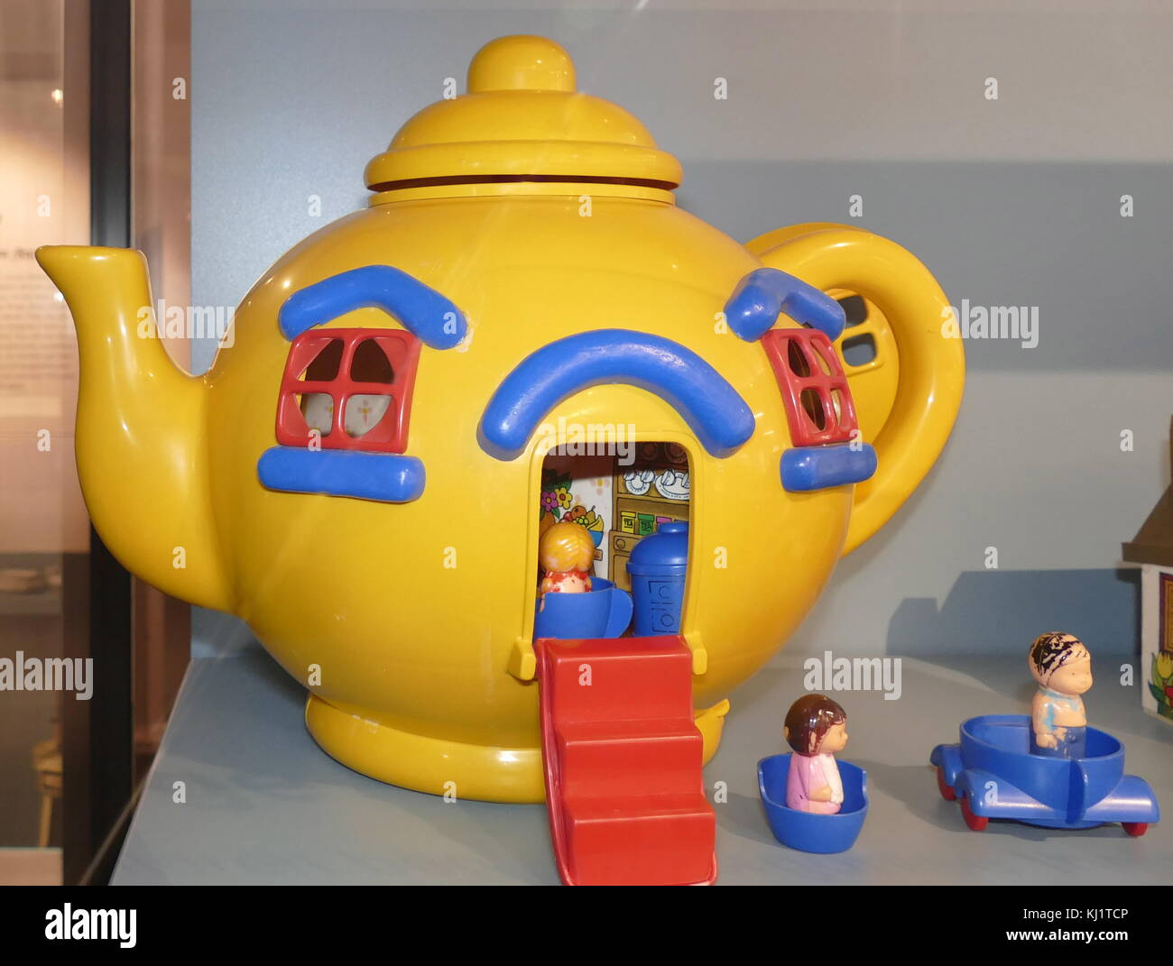 Plastic Teapot Toy House with figures. British 1985 Stock Photo