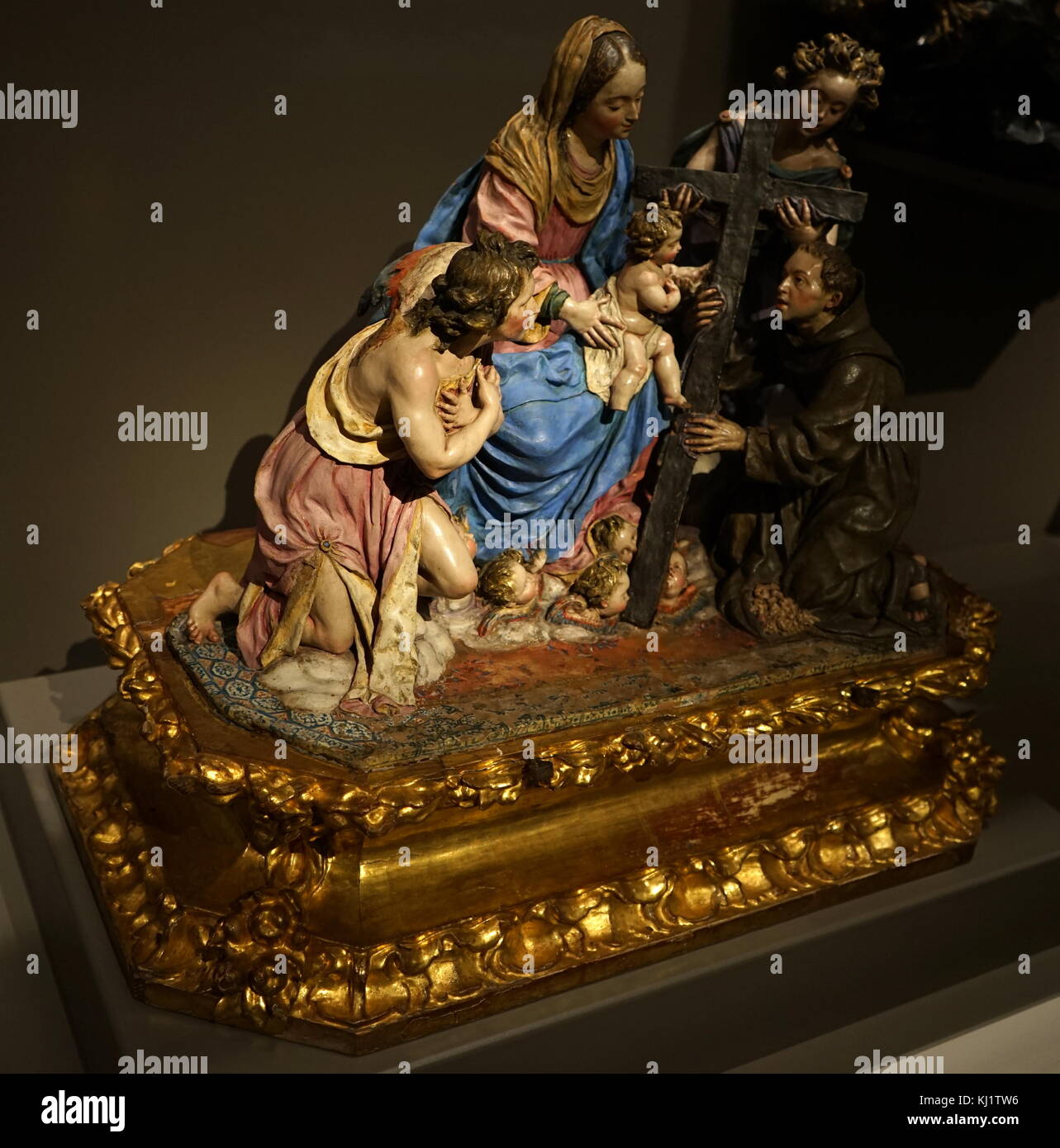 Sculpture titled 'The Virgin and Child with St Diego of Alcalá' by Luisa Roldán (1652-1706) a Spanish sculptor of the Baroque period. Dated 17th Century Stock Photo