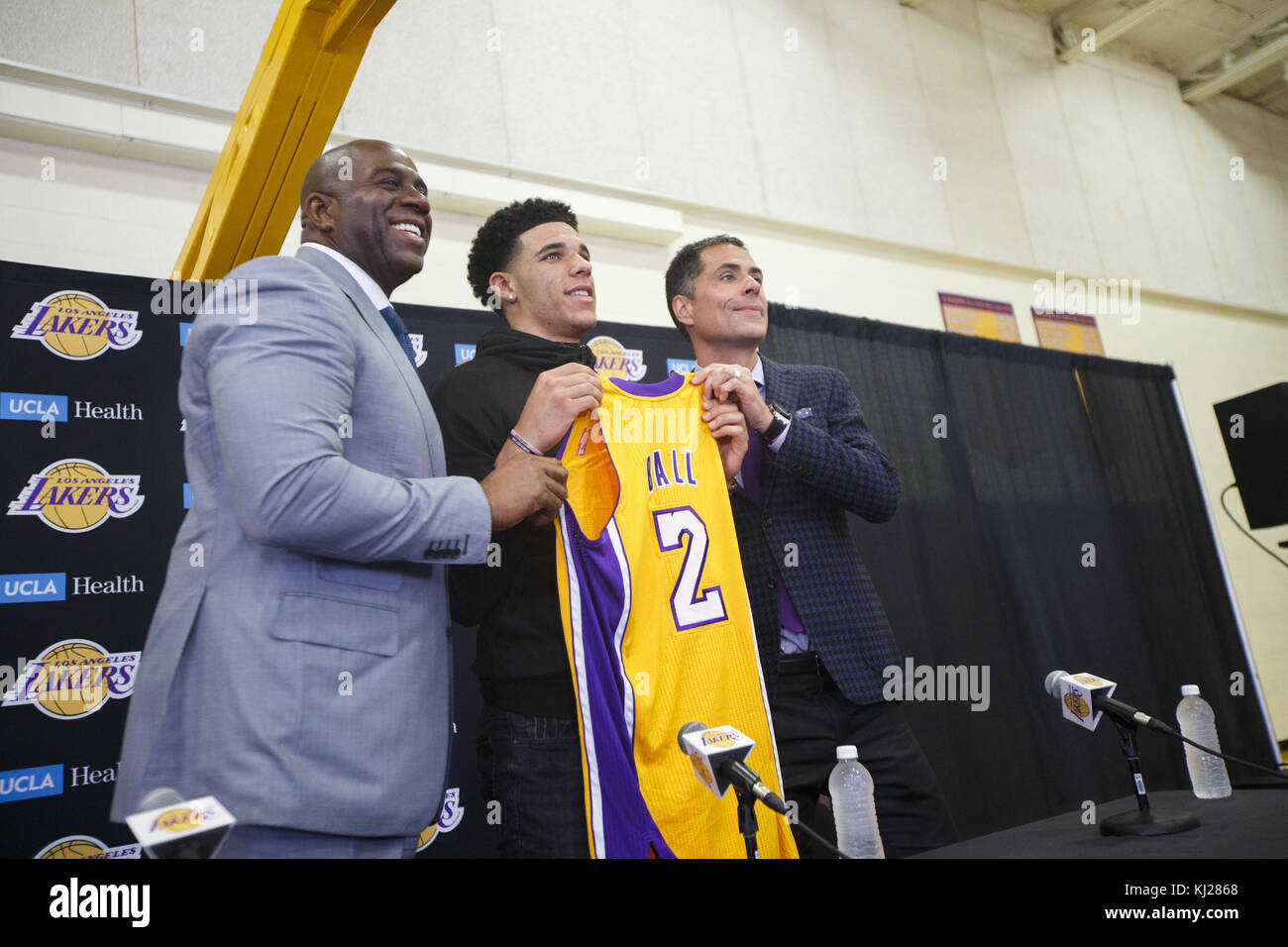 El Segundo, California, USA. 23rd June, 2017. Dodgers pitcher Kenley Jansen,  wearing a Lakers jersey, shares a moment with Lakers draft pick Lonzo Ball  after he threw out the first pitch at