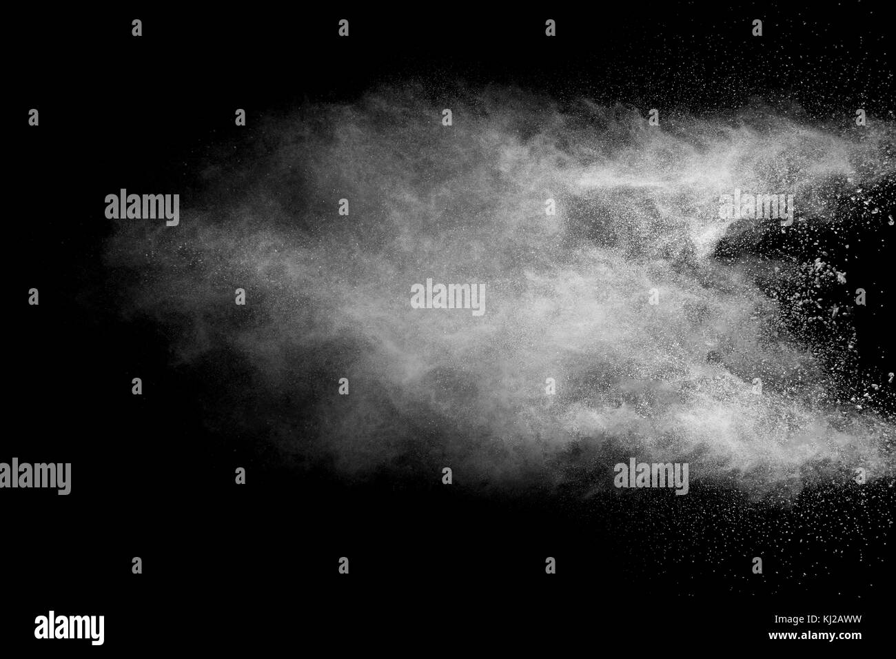 Launched white powder isolated on black background Stock Photo Alamy