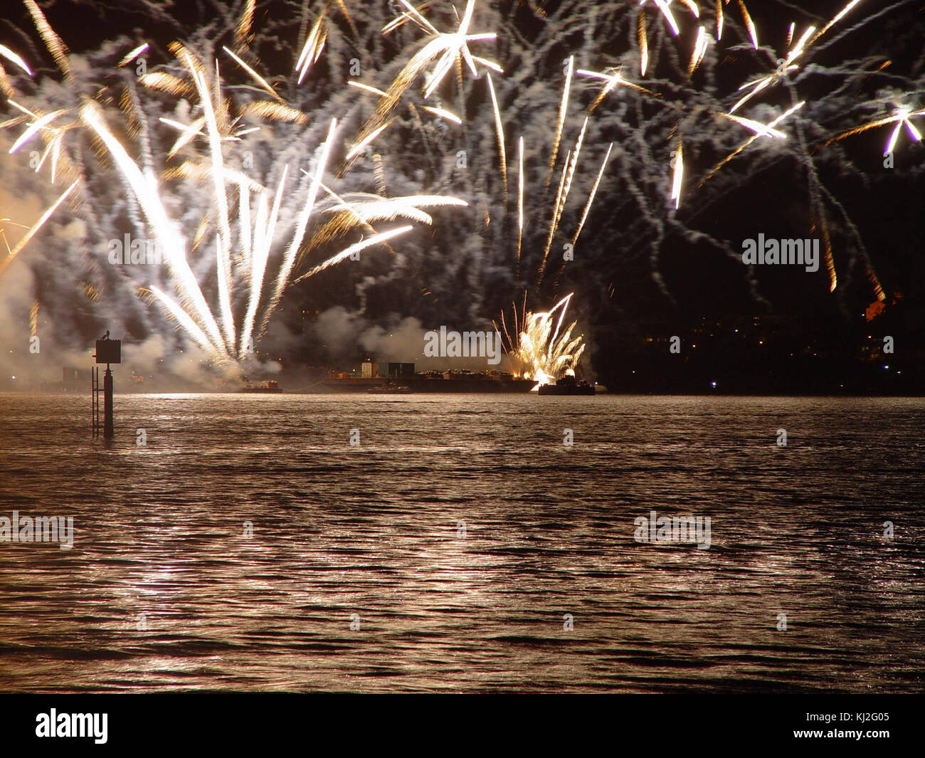 Barges launching fireworks on swan river Stock Photo Alamy