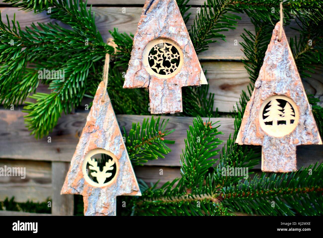 Cone pine, golden bells decorations, red and orange christmas tree ball on  white Stock Photo - Alamy