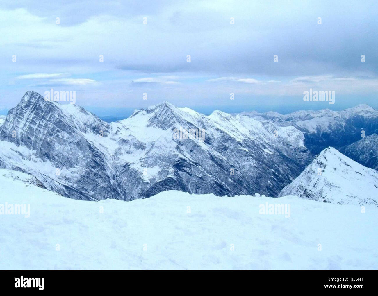 Alp mountains covered with snow Stock Photo - Alamy