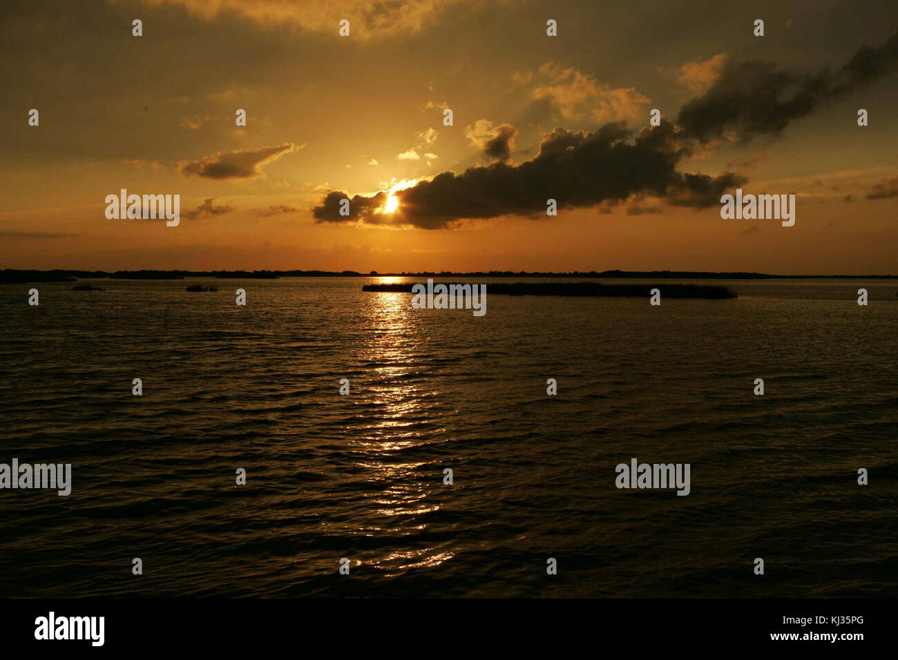 Sunset with dark clouds Stock Photo - Alamy