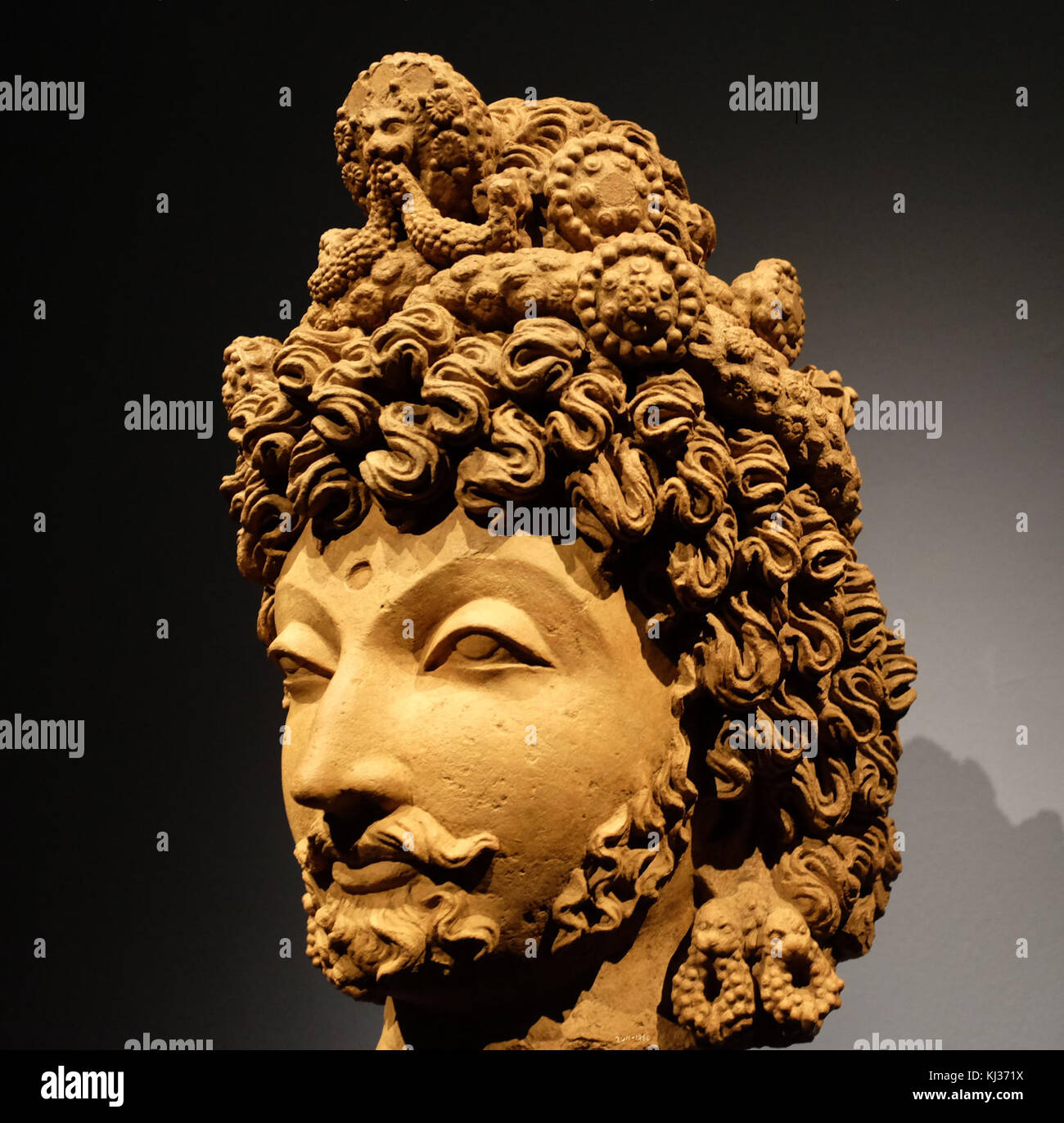 Gandharan sculpture - head of a bodhisattva Stock Photo