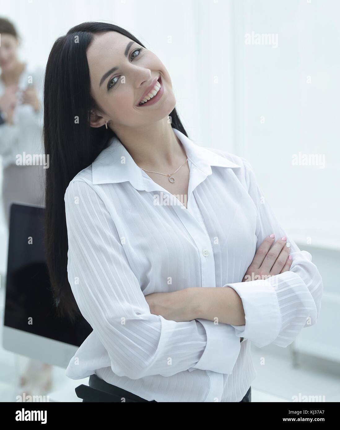 successful young business woman on the background of a workplace Stock ...