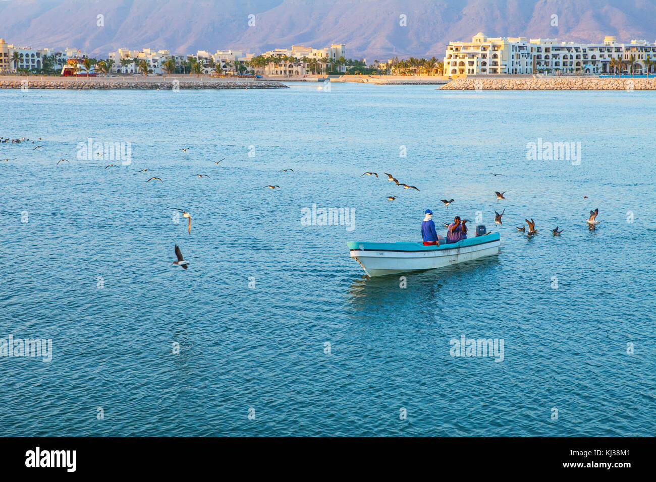 SALALAH, OMAN - JANUARY 07, 2016: Omani fishermen fishing near Salalah, Dhofar, Sultanate of Oman, January 07, 2016 Stock Photo