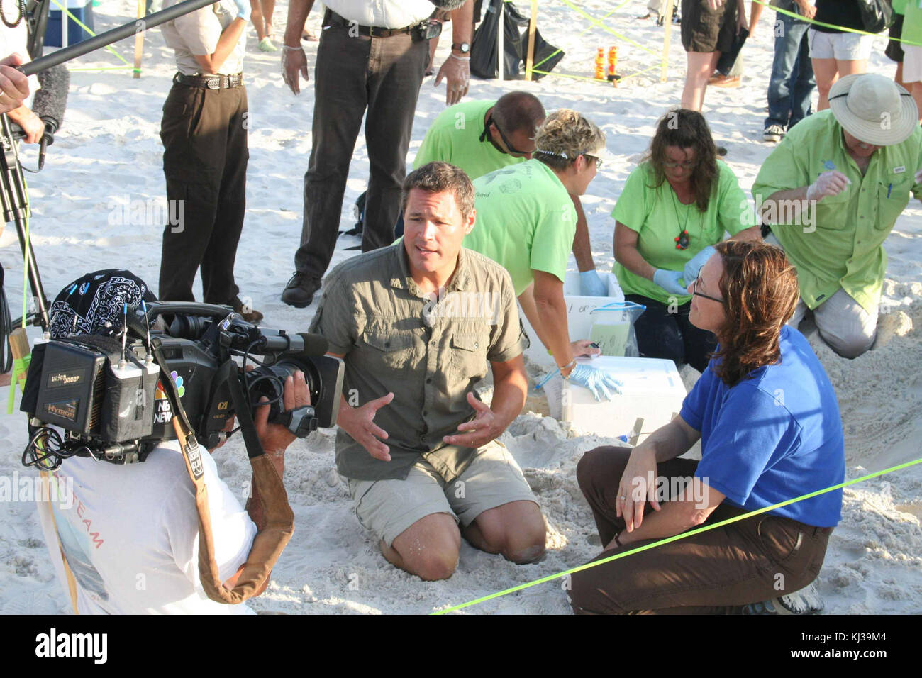 TV film crew shooting a documentary report on the beach Stock Photo