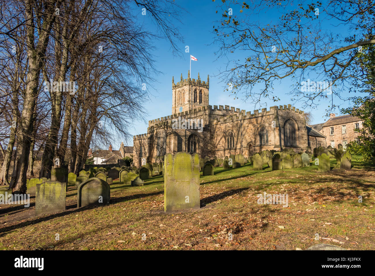 The grade 1 listed parish church of St Mary, Barnard Castle, County Durham, North East England, UK in strong autumn sunshine under a clear blue sky Stock Photo
