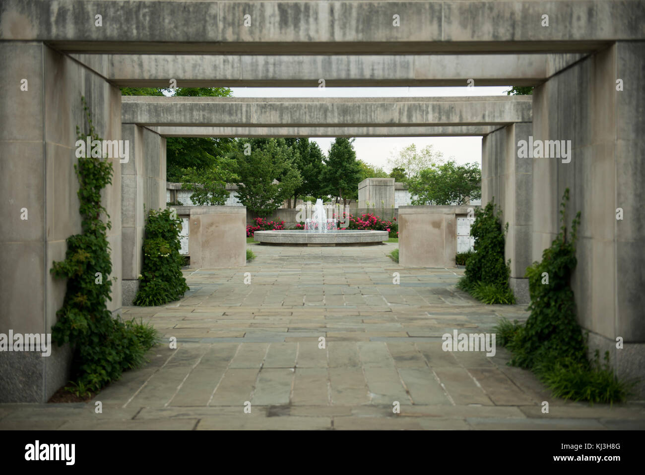 Summer flowers and plants grow outside of the Columbarium Courts in Arlington National Cemetery (27695807806) Stock Photo