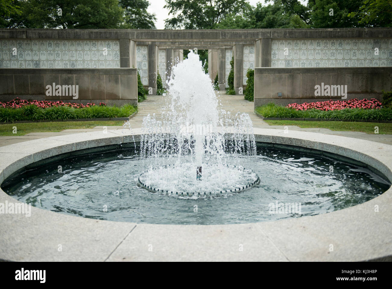 Summer flowers and plants grow outside of the Columbarium Courts in Arlington National Cemetery (27695756956) Stock Photo