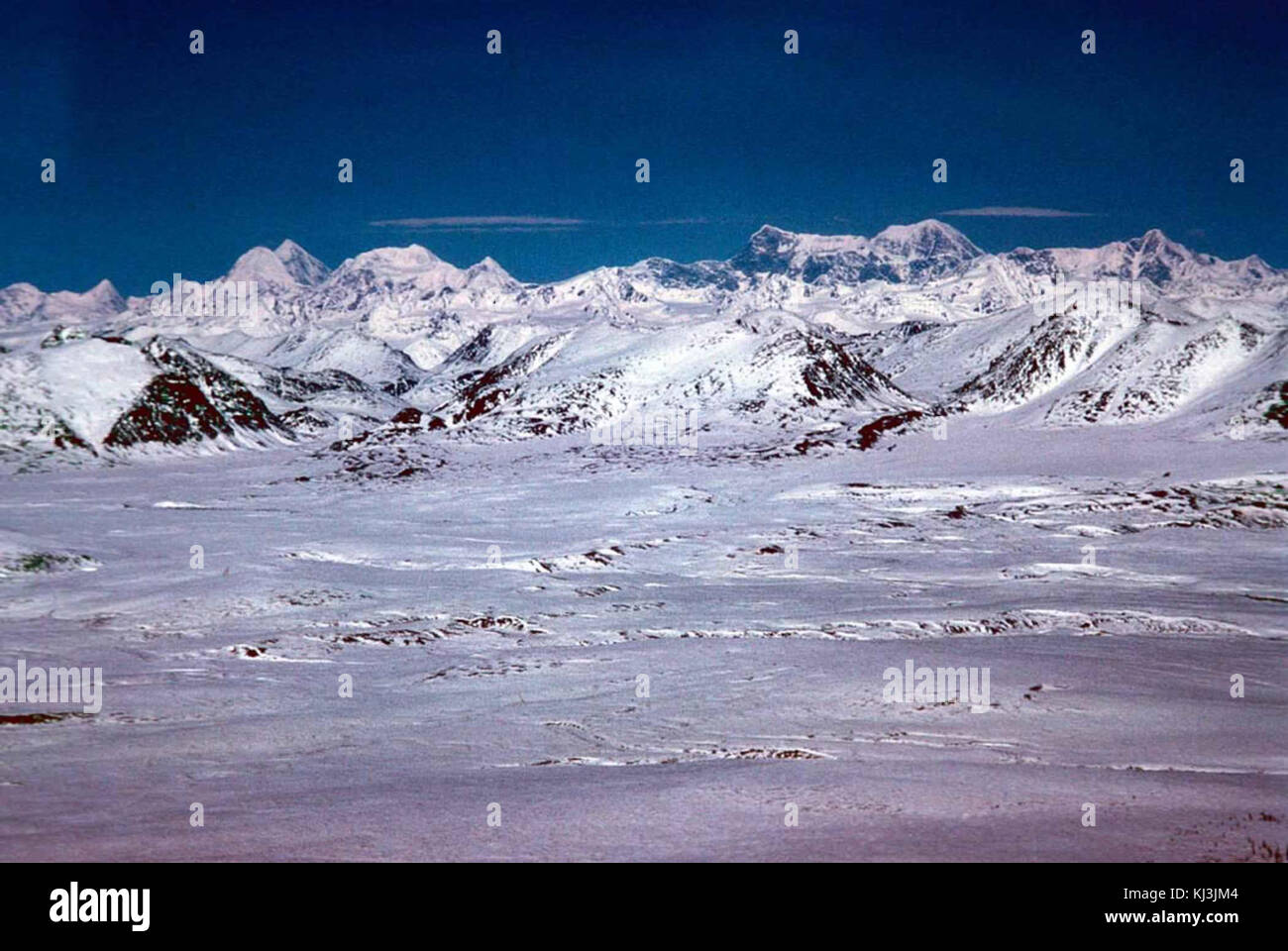 The winter mountain range landscape captures the stark beauty of snow ...