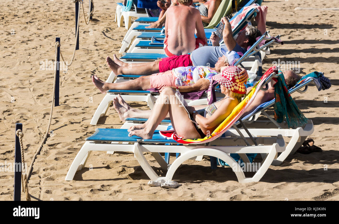 Woman sunbathing beach spain hires stock photography and images Alamy