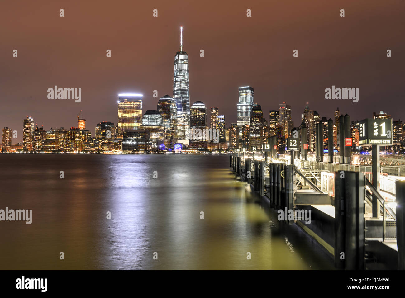 New York City Manhattan skyline at night over Hudson River viewed from ...