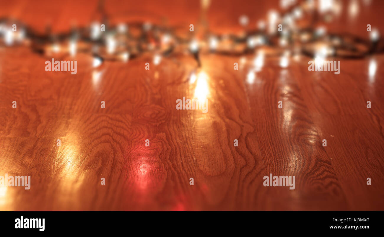 Blurred Christmas lights on wooden floor, copy space Stock Photo Alamy