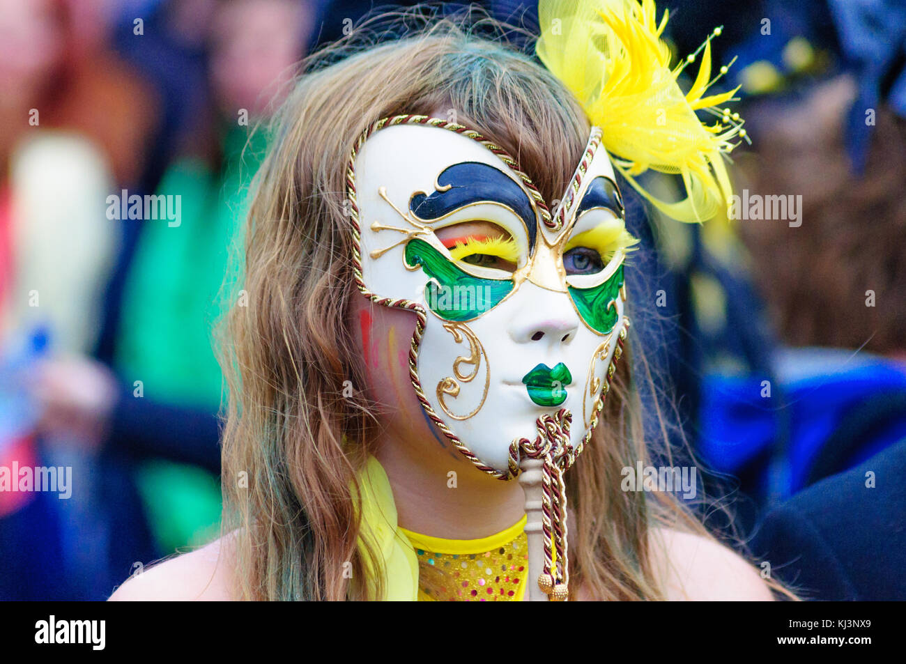 Female performer wearing a porcelain mask in the Carnival of The