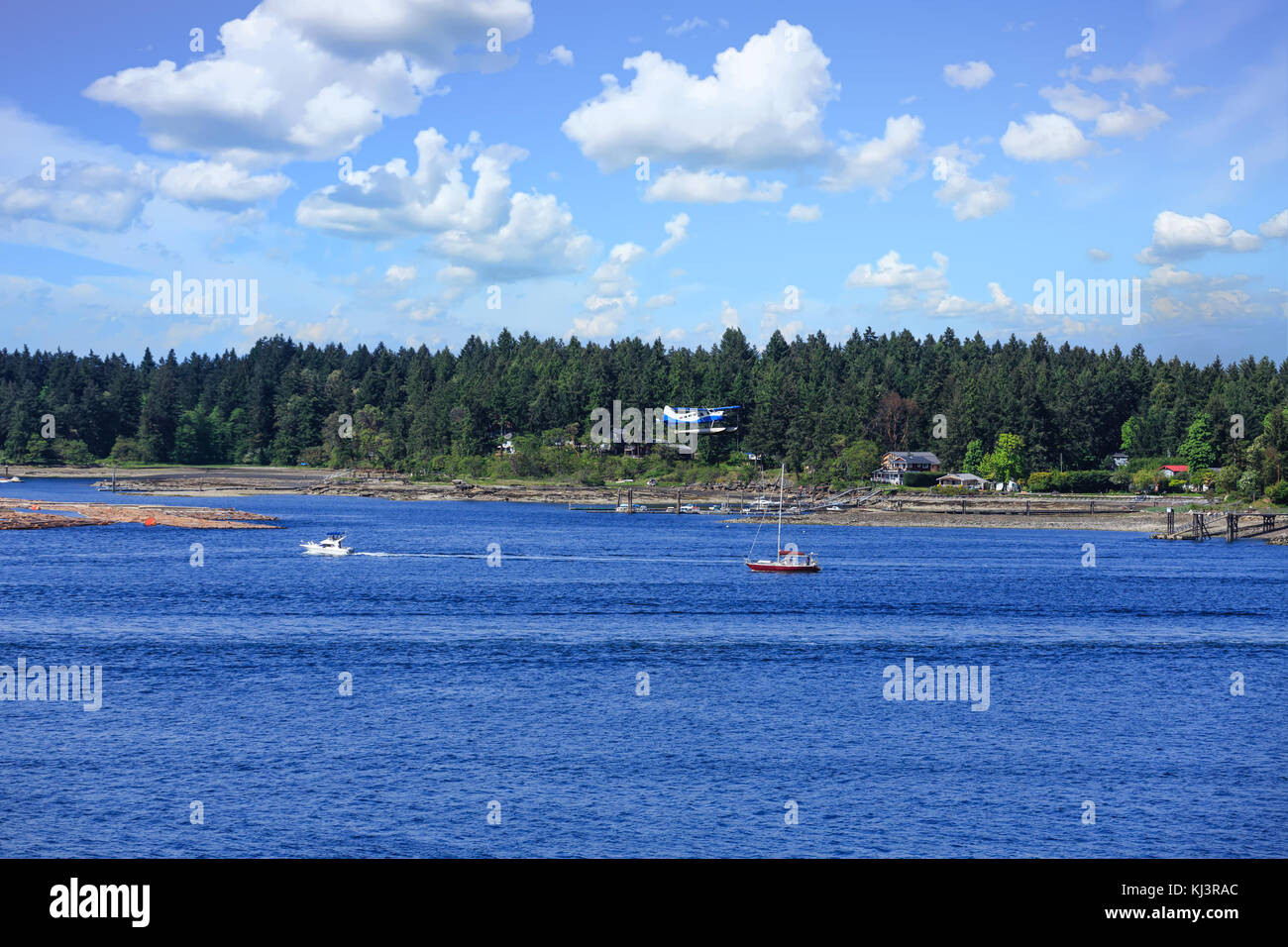 Seaplane and Sailboat off Gallows Point British Columbia Stock Photo