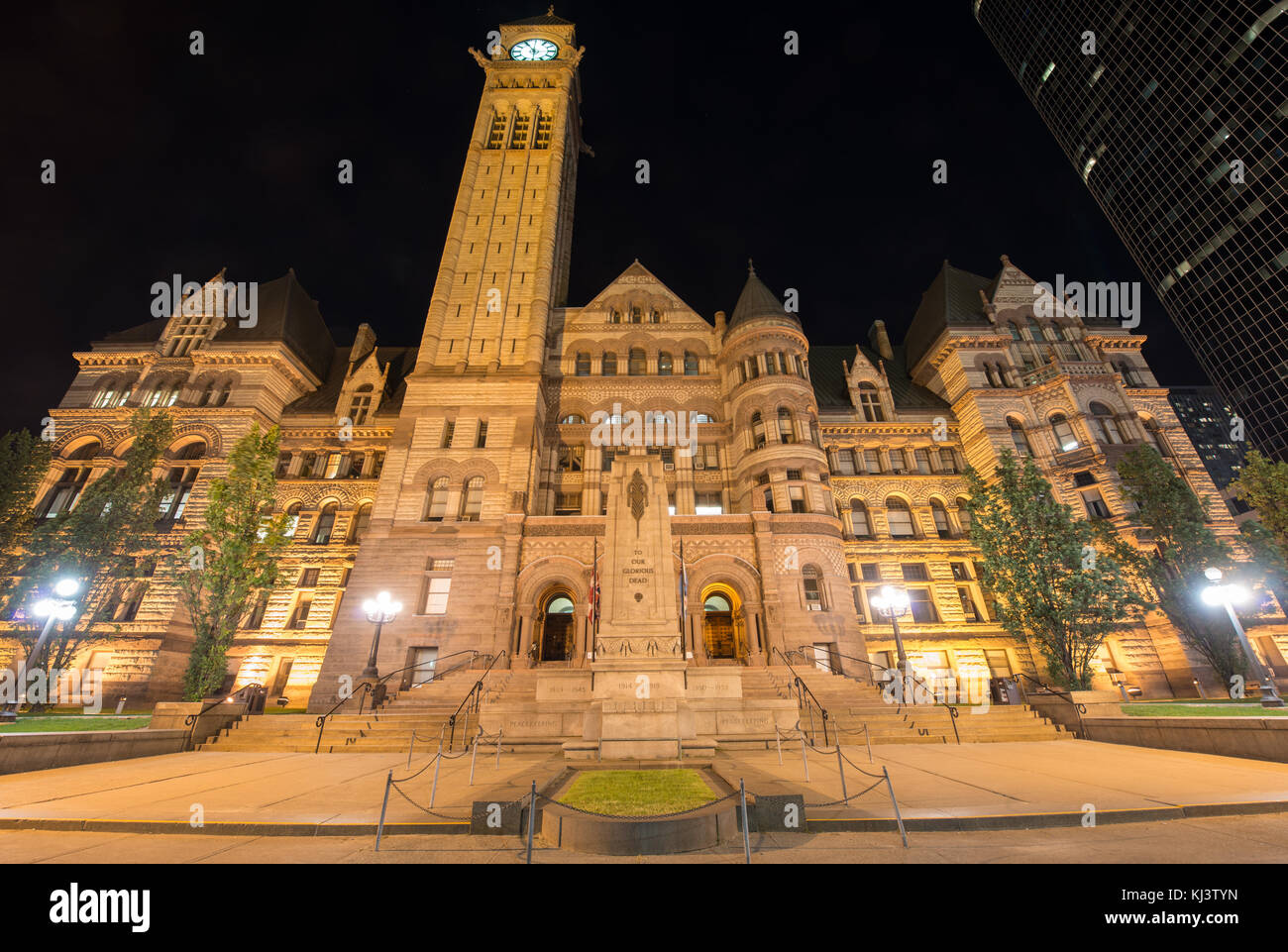 Toronto's Old City Hall at night. One of the largest buildings in Toronto and the largest civic building in North America upon completion in 1899. Stock Photo