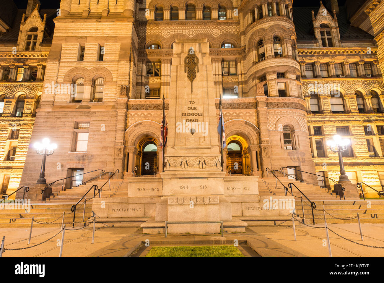 Toronto's Old City Hall at night. One of the largest buildings in Toronto and the largest civic building in North America upon completion in 1899. Stock Photo