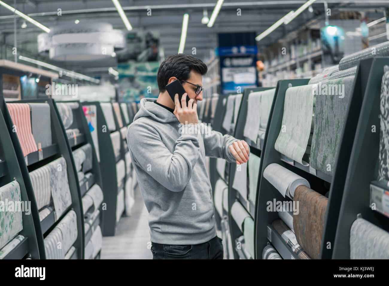 customer buying wallpaper in the car supermarket Stock Photo Alamy
