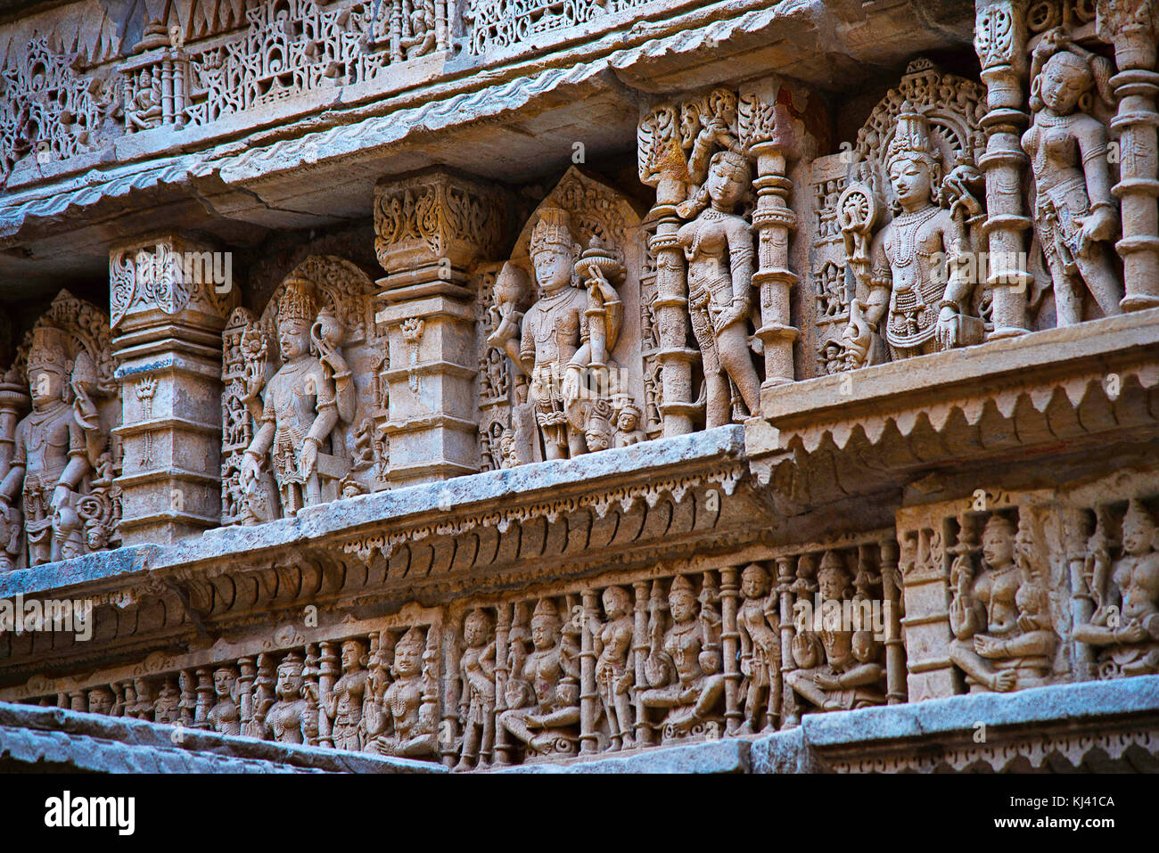 Carved idols on the inner wall of Rani ki vav, an intricately constructed step well. Patan in Gujarat, India. Stock Photo