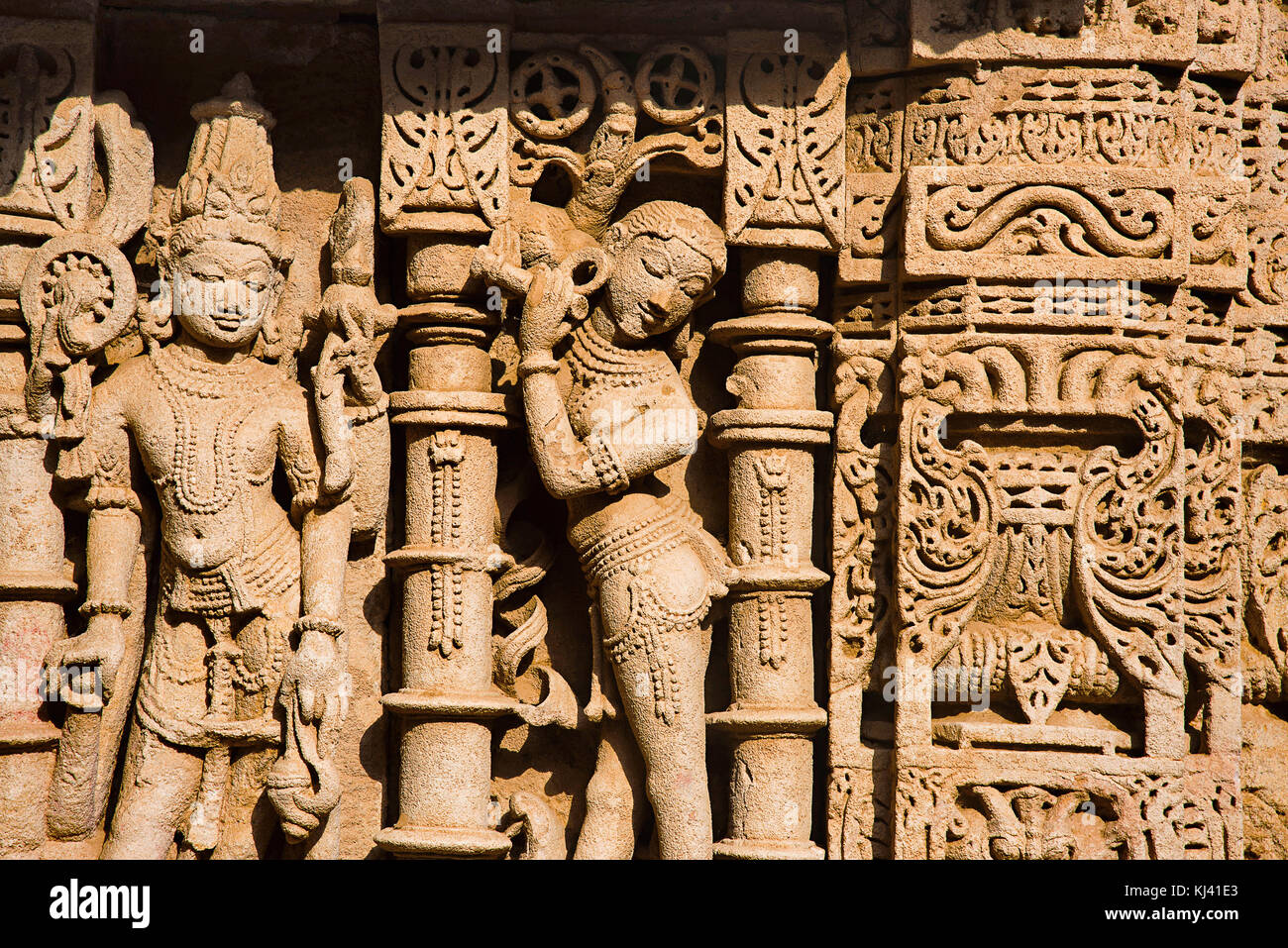 Carved idols on the inner wall of Rani ki vav, an intricately constructed step well. Patan in Gujarat, India. Stock Photo