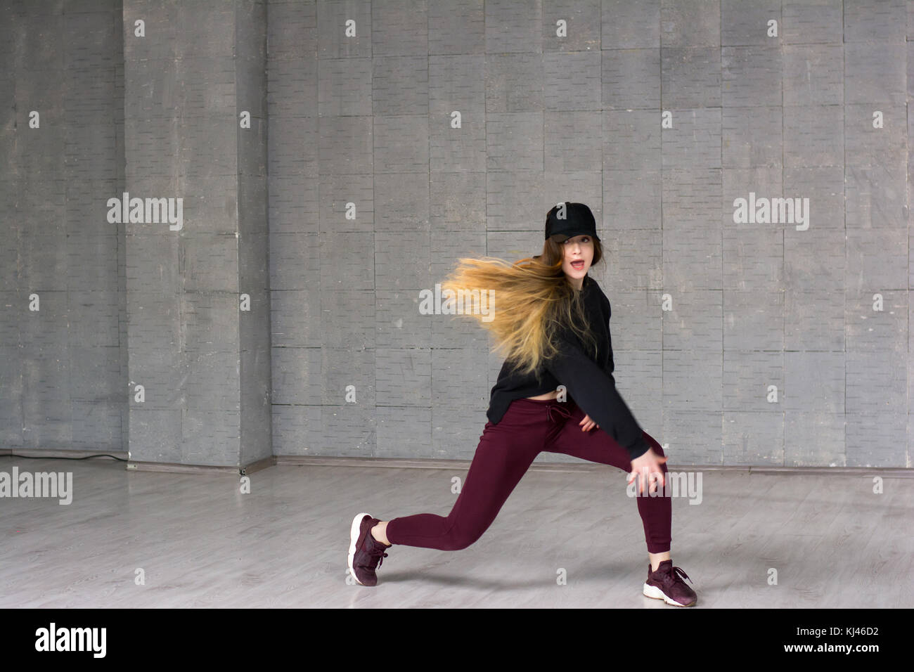 Young pretty skillful rap dancer Stock Photo - Alamy
