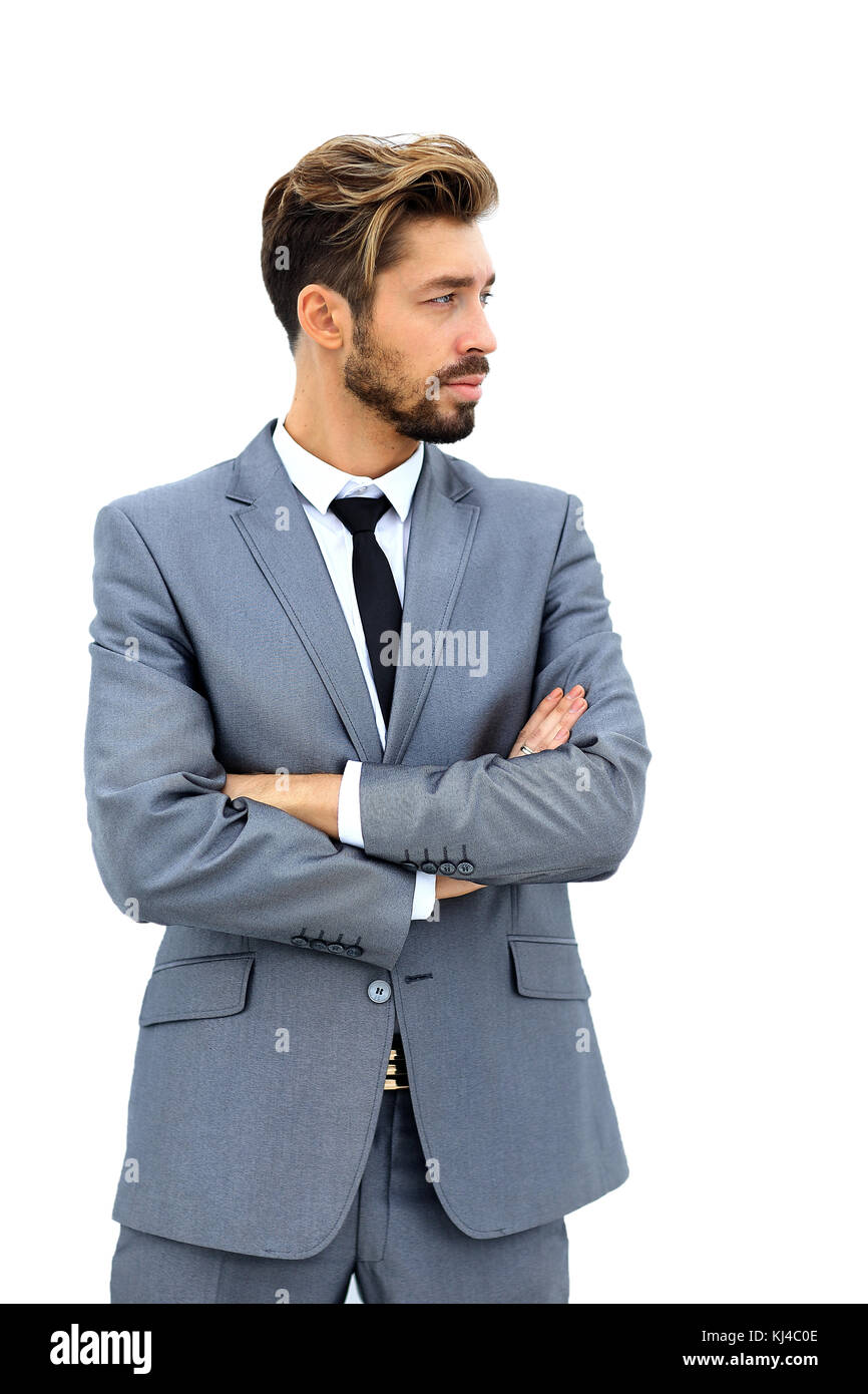business man with arms crossed in a white background Stock Photo - Alamy