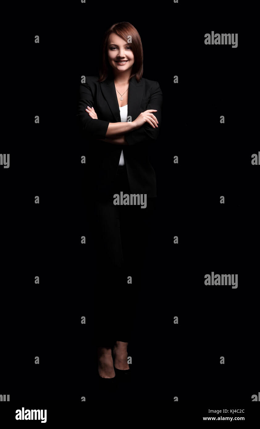 portrait of confident business woman. isolated on a dark backgro Stock ...