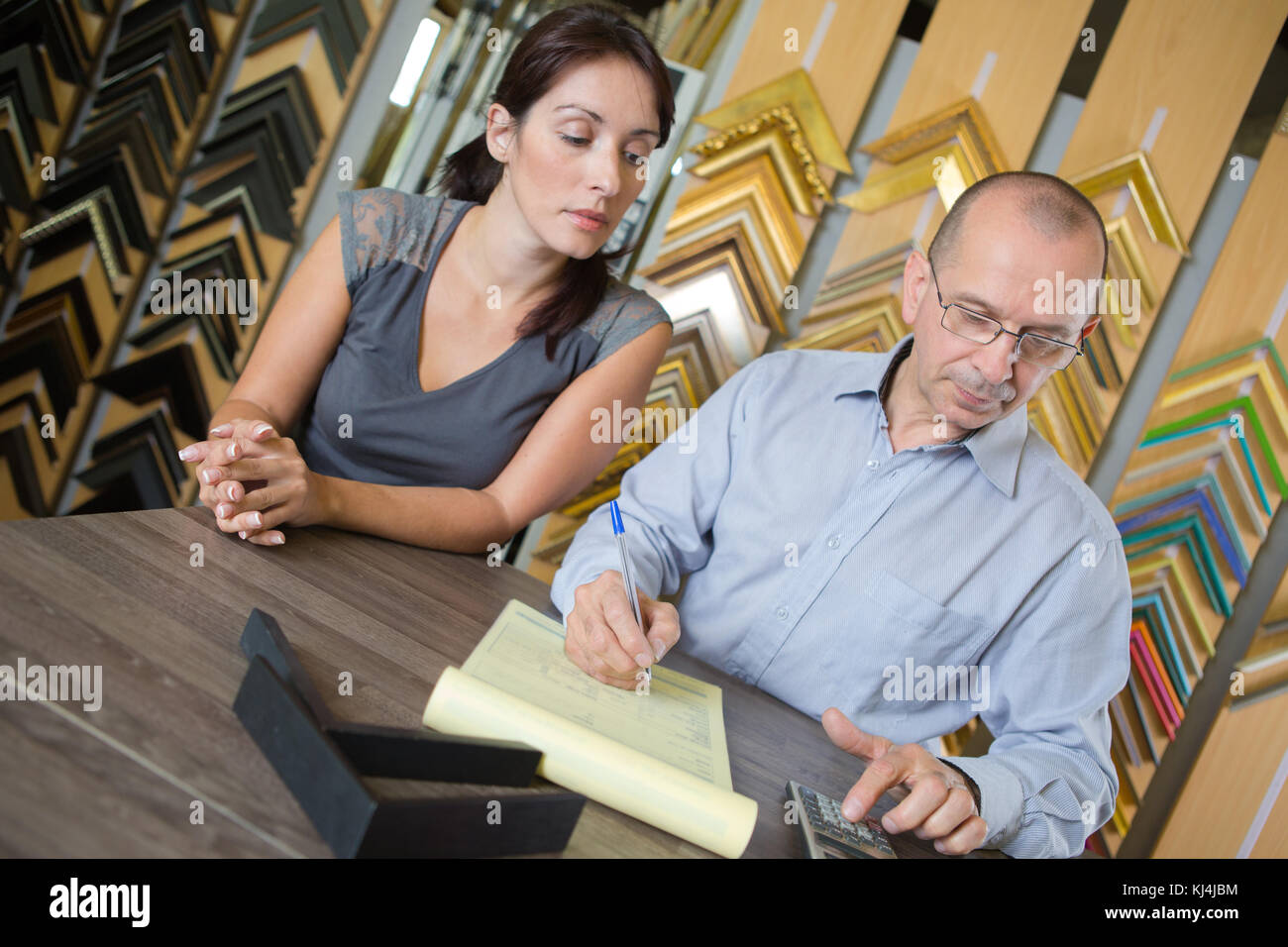 young attractive couple accounting at home Stock Photo - Alamy