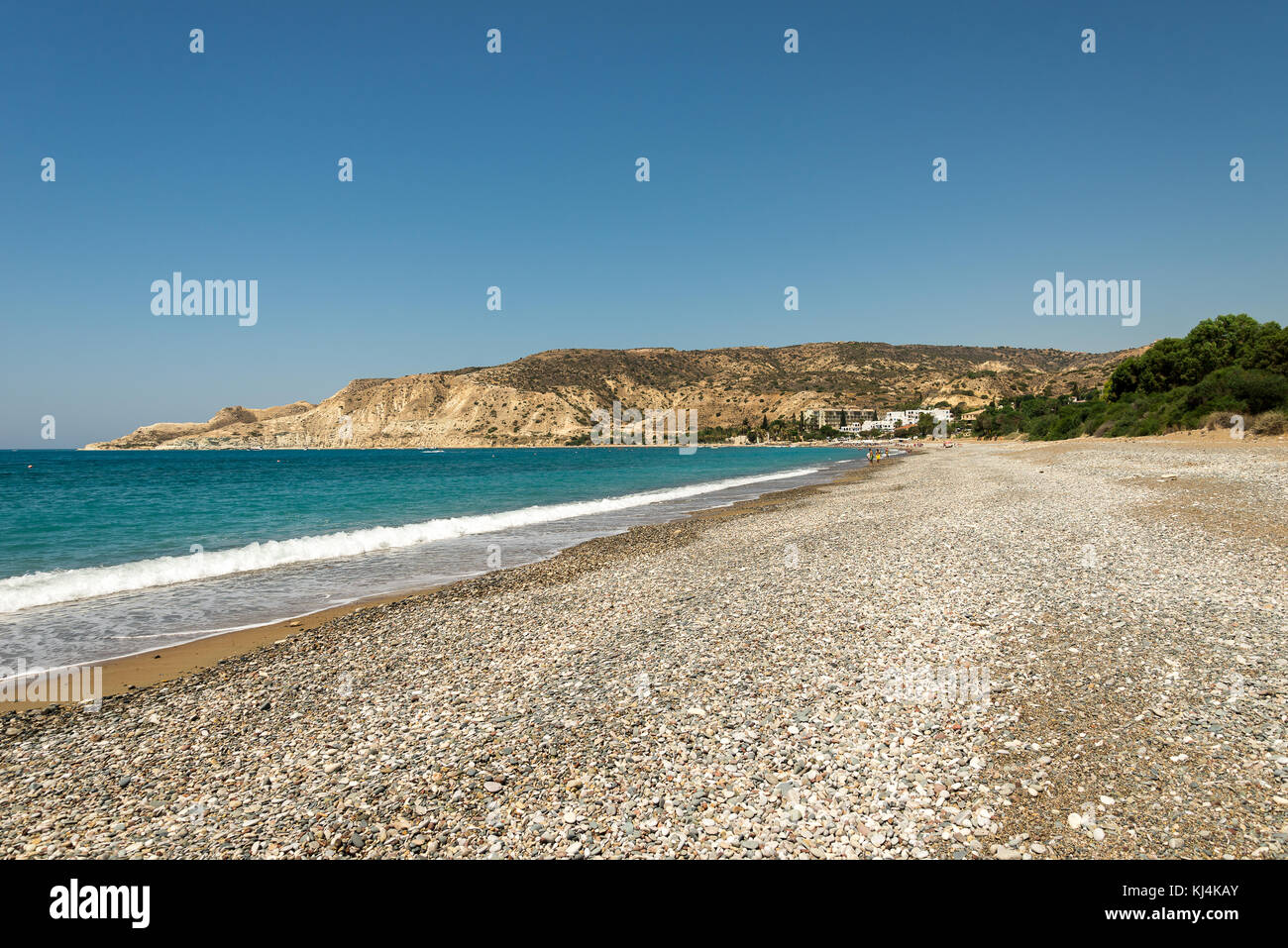 A view to Pissouri Bay pebble beach in a sunny summer day, between Limassol and Paphos, Cyprus Stock Photo