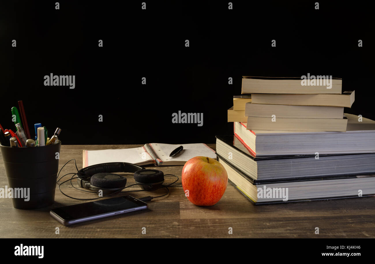 Study Table Desk With Books A Open Sketch Book And Pencil