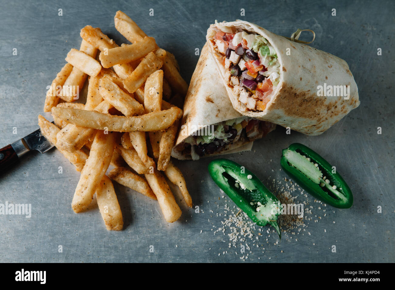 BLACKENED CHICKEN WRAP with BLACK BEANS, PICO DE GALLO, LETTUCE, TOMATO