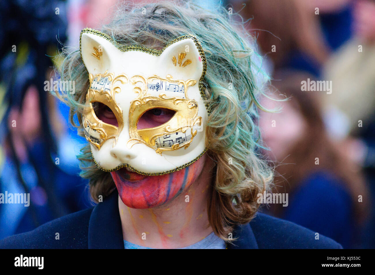 Male performer wearing a porcelain cat mask in the Carnival of The ...
