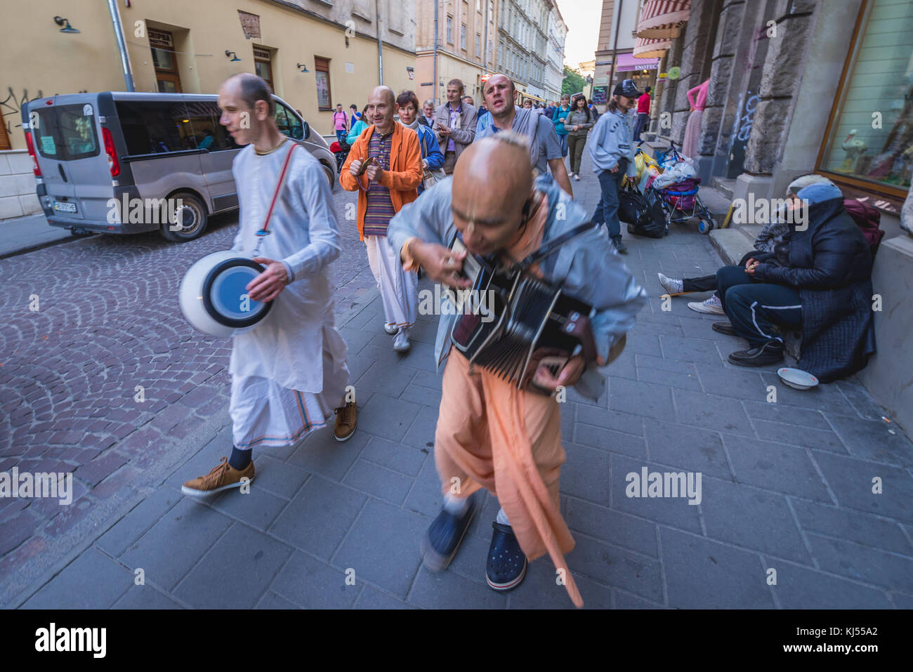 Hare Krishna singings march through the street Stock Photo - Alamy