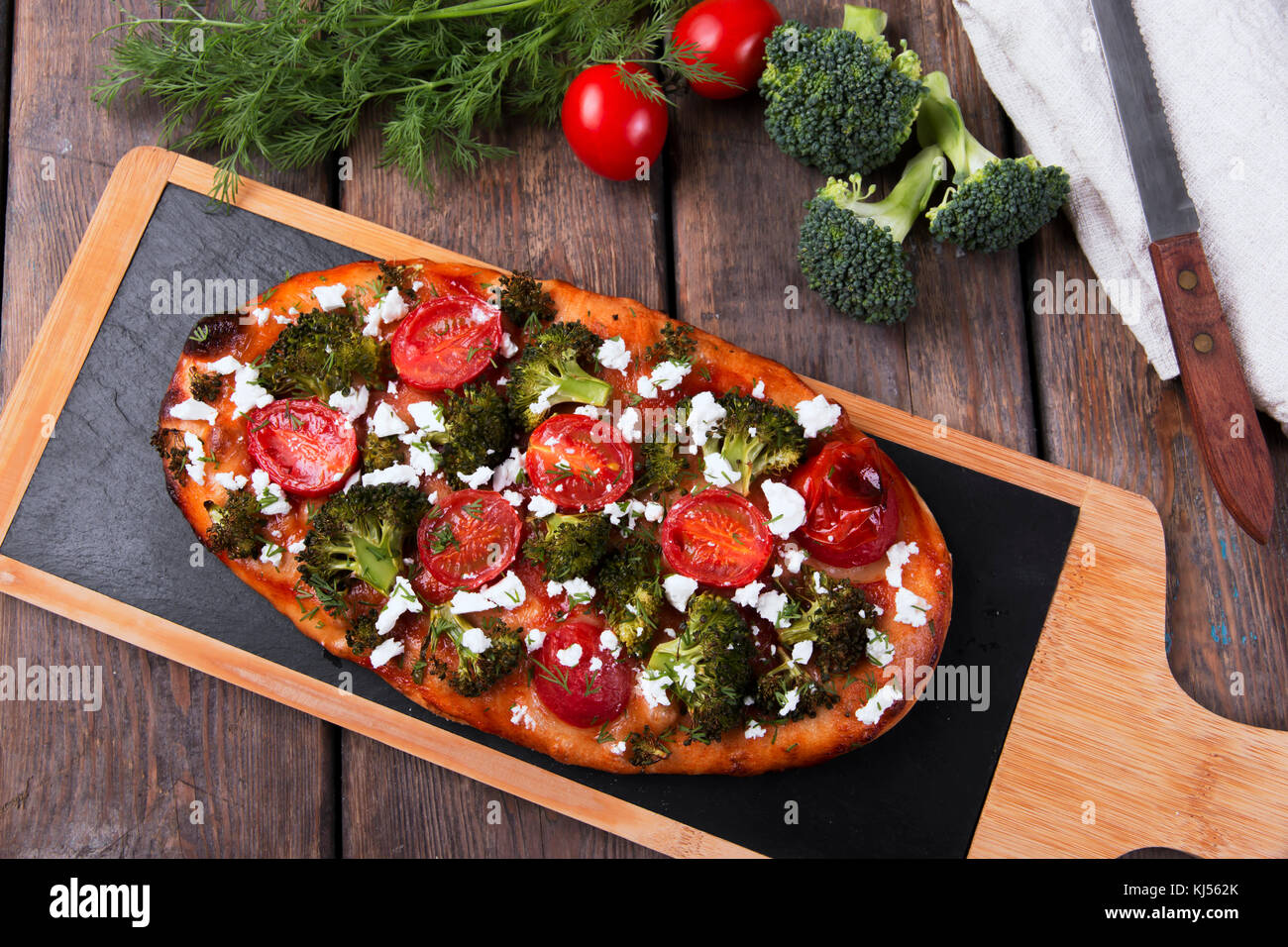 tart quiche with broccoli tomato and goat cheese Stock Photo Alamy