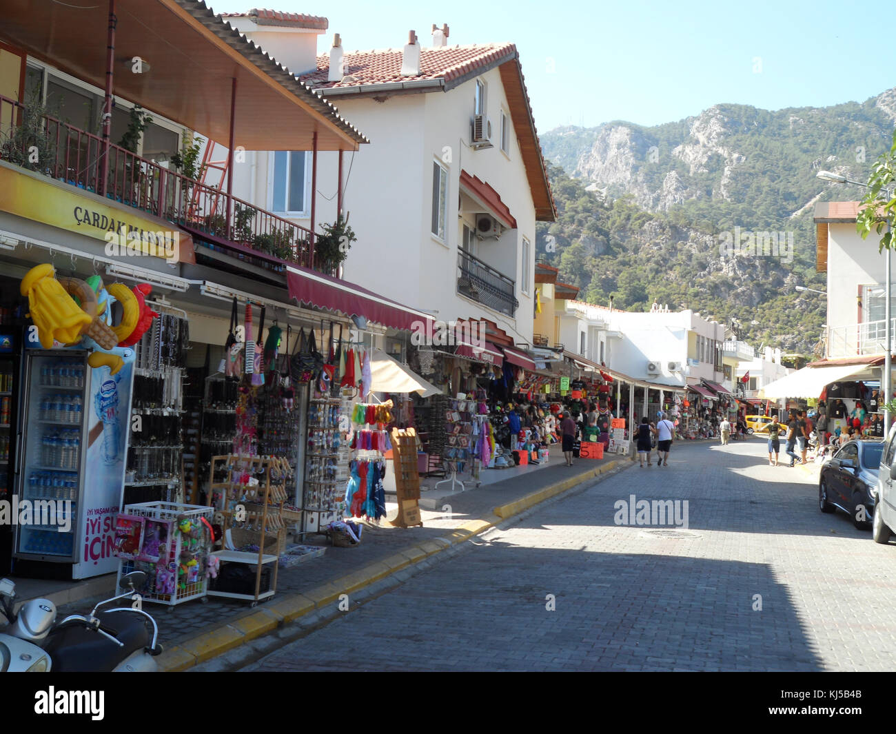The main shopping street full of supermarkets in the coastal village of Turunc, Turkey Stock Photo