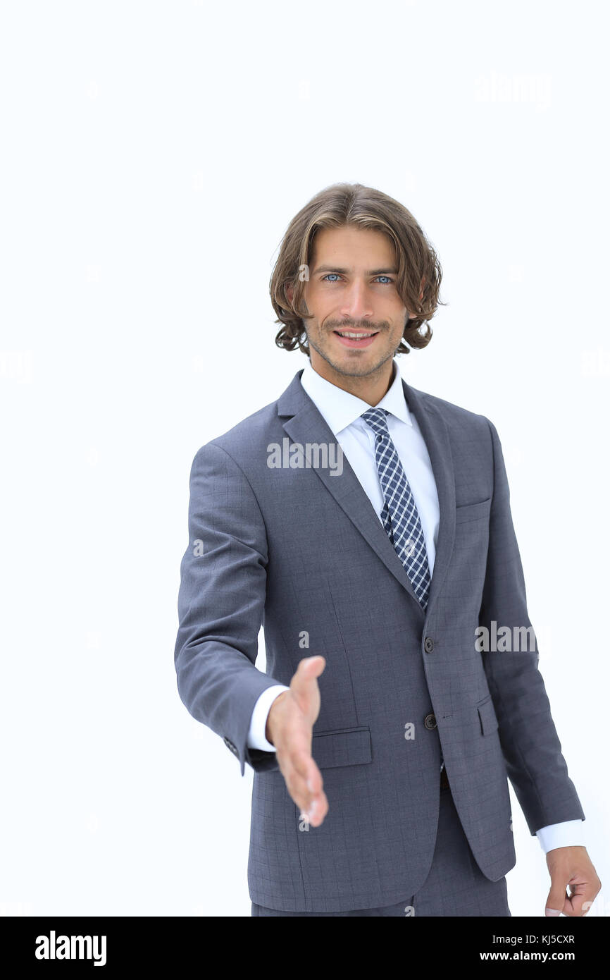 Smiling friendly businessman offers a handshake Stock Photo