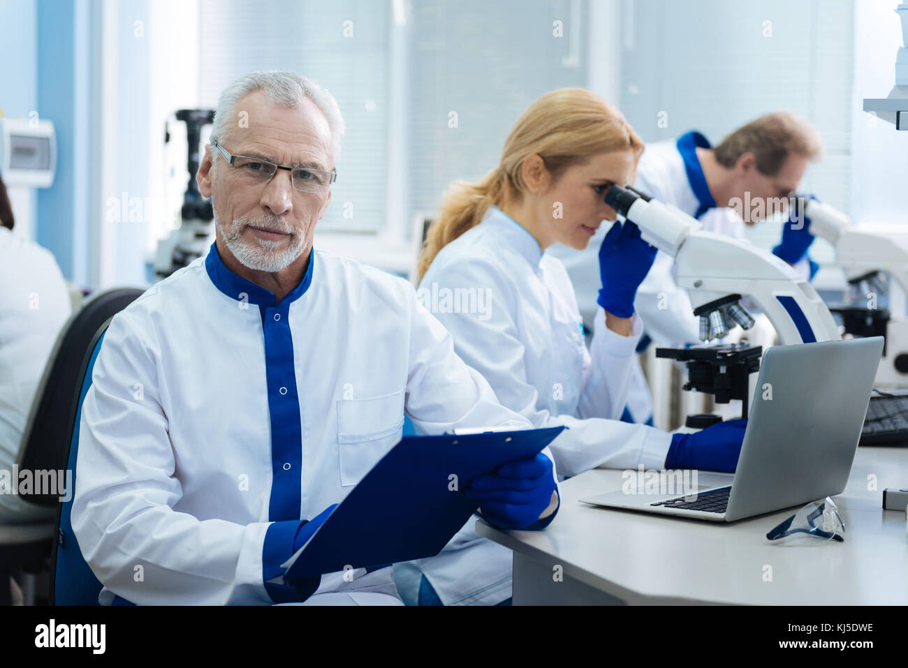 Concentrated scientist making a research Stock Photo