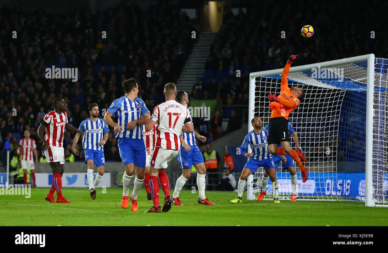 Maty Ryan of Brighton tips the ball over the bar from a Ryan Shawcross header during the Premier League match between Brighton and Hove Albion and Stoke City at the American Express Community Stadium in Brighton and Hove. 20 Nov 2017. **** EDITORIAL USE ONLY ***  FA Premier League and Football League images are subject to DataCo Licence see www.football-dataco.com Stock Photo
