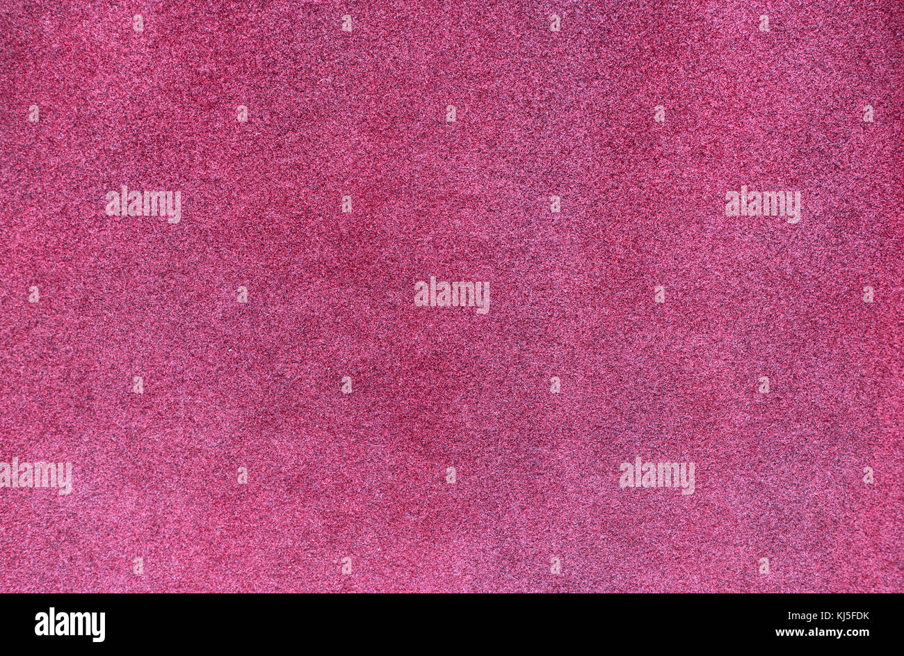 Red carpet texture. Pale smooth carpet. Velvet paper background Stock Photo