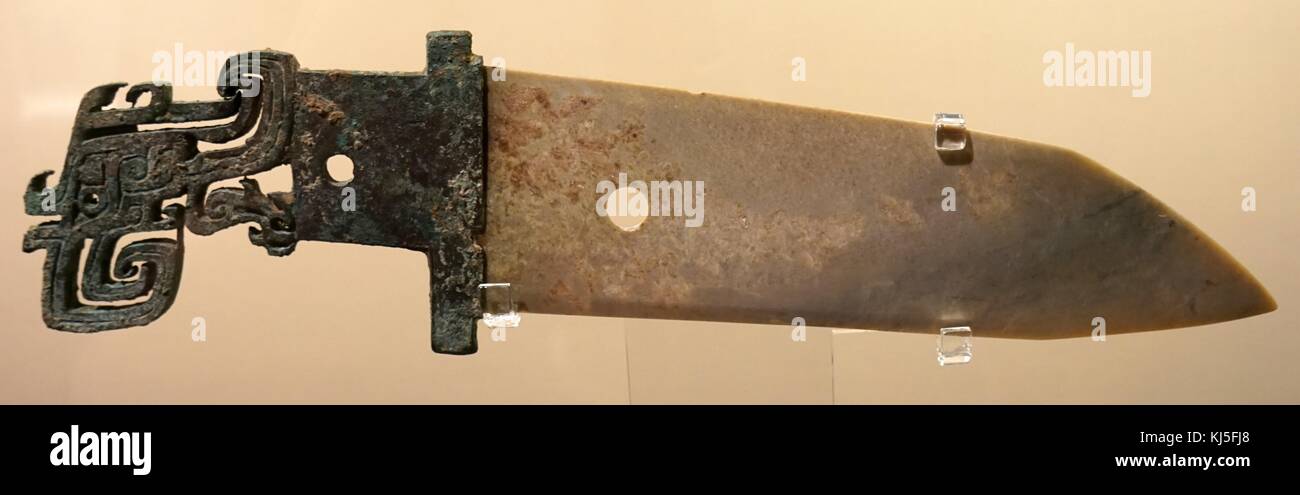 Halberd with Bronze Handle from the Shang Dynasty. Dated 11th Century BC Stock Photo