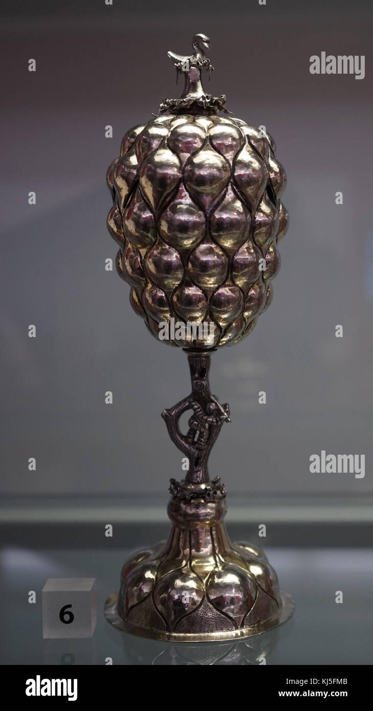 A silver cup shaped like a pineapple, although actually represents grapes. Dated 17th Century Stock Photo