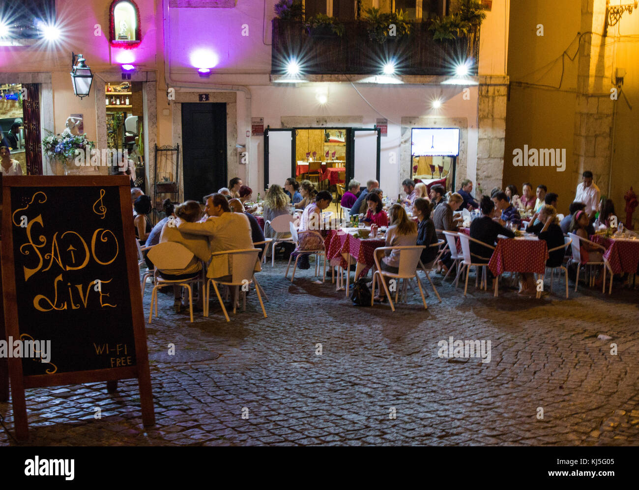 Fado and food with friends in the Alfama District, Lisbon, Portugal Stock Photo
