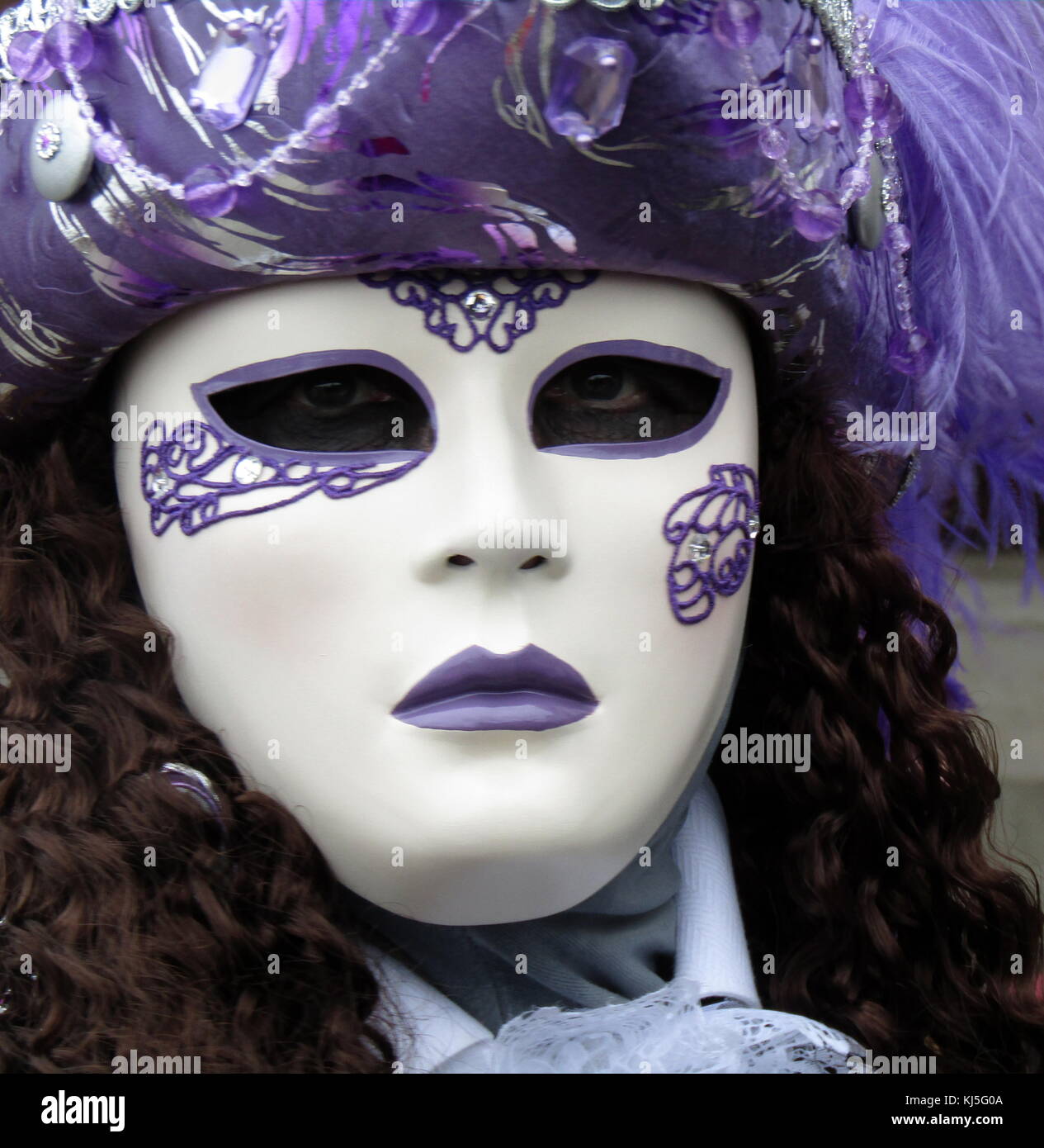 Costumed attendee at the Venice Carnival (Carnevale di Venezia), an annual festival held in Venice, Italy. Started to recall a victory of the 'Serenissima Repubblica' against the Patriarch of Aquileia, in the year 1162. In the honour of this victory, the Stock Photo